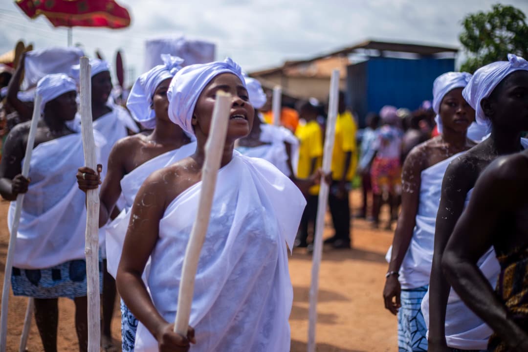 Asebu youth in ceremonial procession